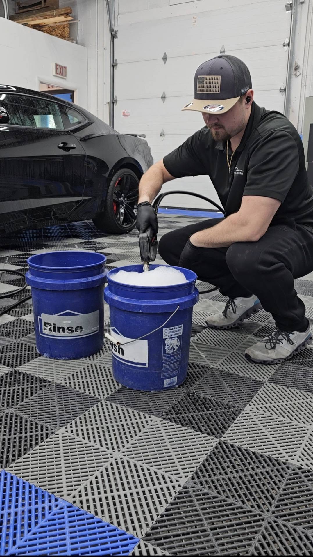 Gerard washing a vehicle during ceramic coating preparation