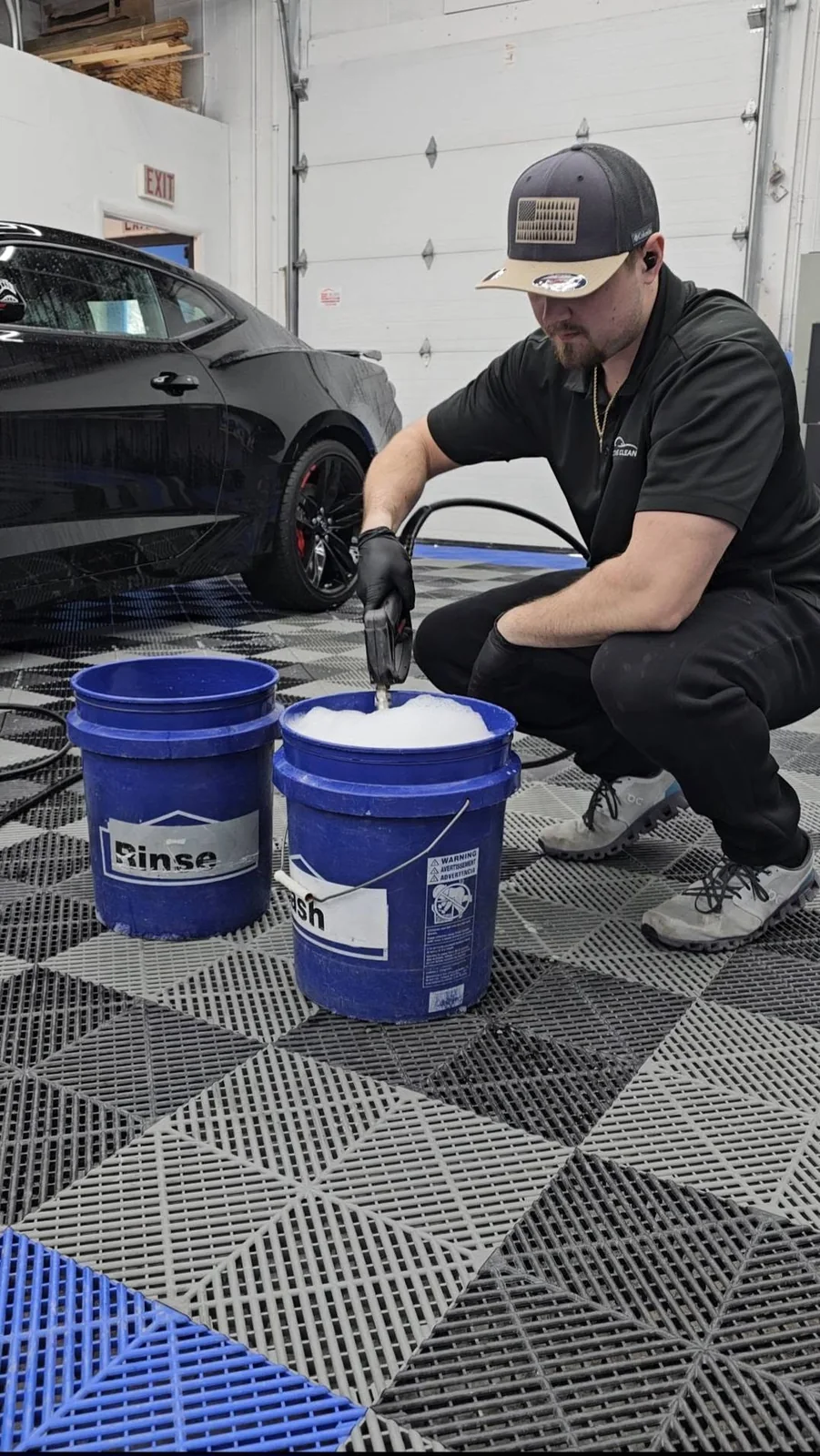 Gerard washing a vehicle during ceramic coating preparation
